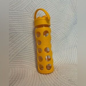 Glass water bottle with rubber grip